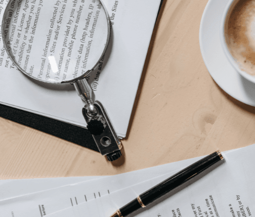 Magnifying glass focusing on job alert notification, symbolizing personalized job search