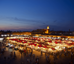 Image of a lively night market with bright lights, representing the dynamic process of applying and tracking opportunities Vibrant night market filled with colorful lights and busy stalls, symbolizing active opportunities and tracking
