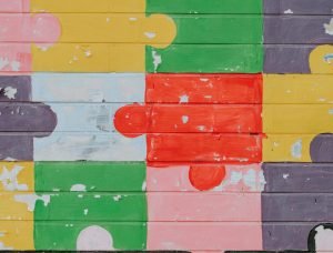 Puzzle pieces fitting together symbolizing expert matching services that connect humanitarian consultants with the right missions.